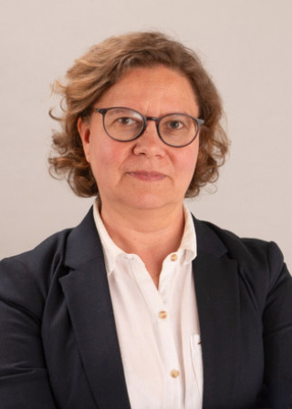 Taina Sjoholm